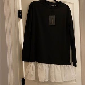 Sweater dress with frill hem